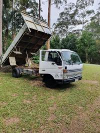 our little old tipper truck too take all the waste away