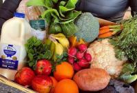 Organic subscription box available with milk and bread.