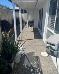 Pressure cleaning pebble crete