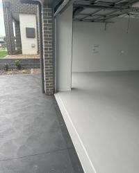 Concrete sealing a driveway.
Epoxy coatings inside the garage floor.
House in East Maitland